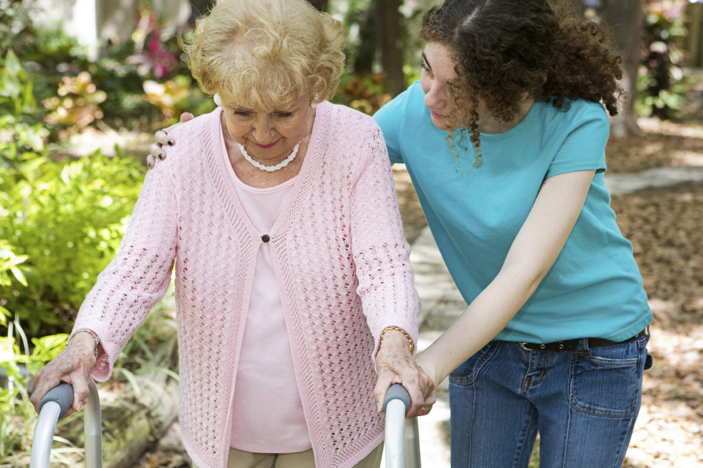 Caregiver assisting client at home